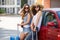 Summer vacation to beautiful women travelling by car
