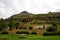 Summer vacation. Travelling and wanderlust. Mountain village on cloudy sky in Sejdisfjordur, Iceland. Country houses on