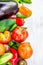 Summer vegetables on white wooden table