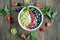 summer vegetarian breakfast bowl with fresh fruit and chia seeds