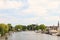 Summer view of the Amstel river with houses and boats in the small Dutch village of Ouderkerk aan de Amstel