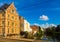 Summer view of Ghent with typical Flemish townhouses on banks of river Leie