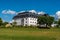 Summer view of the historic old white institution building in Wenngarn used for treatment of alcoholics.