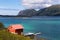 Summer view of Lofoten Islands with red rorbu