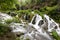 Summer view of Roughlock Falls in the Black Hills National Forest of South Dakota