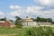 Summer view of Shaker round barn and fields
