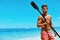 Summer Water Sport. Man With Canoe Kayak Paddle On Beach