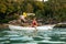 Summer Water Sport. Woman Traveling In Kayak Near Green Island