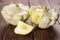 Summer white pattypan squash on brown wood