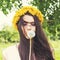 Summer woman outdoors. Beautiful woman enjoying flowers