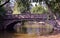 Summertime: boating at the bridge in Cismigiu Park, Bucharest, R