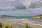 Summertime.Gargano coast: Portonuovo beach,Vieste-(Apulia) ITALY-In the background the Gattarella islet or Portonuovo