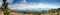 Summertime landscape banner, panorama with view of the Poprad River valley, mountains High Tatras