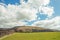 Summertime landscape, fields and cumulus clouds in the British countryside.