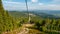 Summertime in the mountains where the ski lift allows for beautiful views.