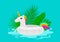 Summertime pool beach holidays background with swimming inflatable unicorn float with tropical leaves