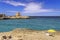 Summertime.Realx on beach: a place in the sun. The most beautiful coast of Apulia: Roca Vecchia, ITALY Lecce.