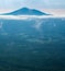 Summertime View of Clouds Around Sharp Top Mountain