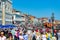 Summertime view of crowded promenade Venice Italy