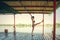 Summertime yoga woman doing yoga on river raft