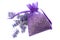 Summery flower fragrance, relaxing naturist gift and floral scent concept theme with dried lavender in a violet cloth bag next to