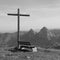 Summit cross and bench on Mount Fronalpstock.