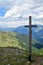 Summit cross rock Panorama landscape of the high mountains in South Tyrol Italy europe