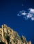 The summit of The Grand Mogul and rising moon, Sawtooth Wilderness, Sawtooth National Recreation Area, Idaho