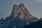 Summit of Machapuchare Fish Tail being hit by first sunshine golden hour, Himalayas