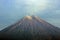 The summit of Mount Semeru under the cloudy