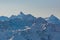 Summit of snowcapped Zinalrothorn mountain in Swiss alps, blue sky