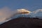 Summit and Yanasacha Rock wall in the Cotopaxi at dusk