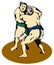 Sumo wrestlers fighting