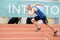 SUMY, UKRAINE - FEBRUARY 21, 2020: sportsman at the start of 200m race at Ukrainian indoor track and field championship