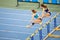 SUMY, UKRAINE - FEBRUARY 22, 2020: sportswomen on 60m hurdles sprint at Ukrainian indoor track and field championship