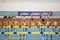 SUMY, UKRAINE - FEBRUARY 22, 2020: Sportswomen at the start in final 60m hurdles contest at Ukrainian indoor track and field