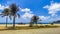 Sun beach sand surfer waves palms in Puerto Escondido Mexico