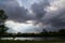 Sun Beams Through Storm Clouds