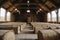 Sun-bleached hay bales stacked in a rustic barn