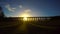 The sun casting long shadows at the Balcombe Viaduct across the River Ouse