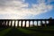 The sun casting long shadows at the Balcombe Viaduct across the River Ouse