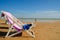 Sun chair on beach in paradise