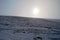 Sun with clouds on Stuhleck peak in Fischbacher Alpen