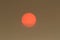 The Sun colour in the Uk was due to a weather phenomenon, Saharan dust, blown in by ex-hurricane Ophelia and also from debris, cau