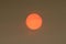 The Sun colour in the Uk was due to a weather phenomenon, Saharan dust, blown in by ex-hurricane Ophelia and also from debris, cau