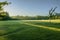 sun drenched youth football field in a city park