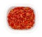 Sun dried tomatoes, Julienne strips in a white punnet, from above