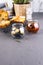 Sun-dried tomatoes in oil and olives in jars. Ingredients for traditional home baking. Free space for text. Copy space