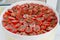 Sun-dried tomatoes in a vegetable dryer.