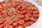 Sun-dried tomatoes in a vegetable dryer.